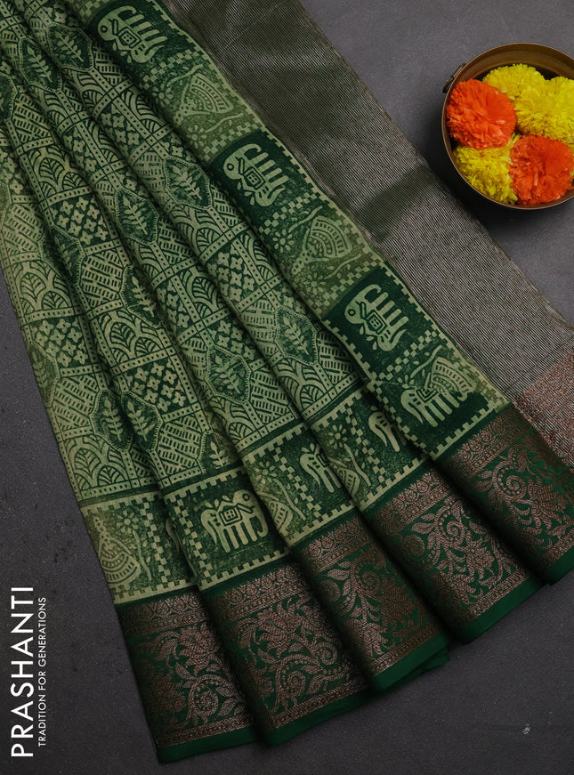 Chanderi silk cotton saree light green and green with allover prints and banarasi style border