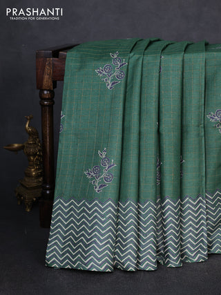 Pure tussar silk saree green with allover zari checks & butta prints and printed pallu & border