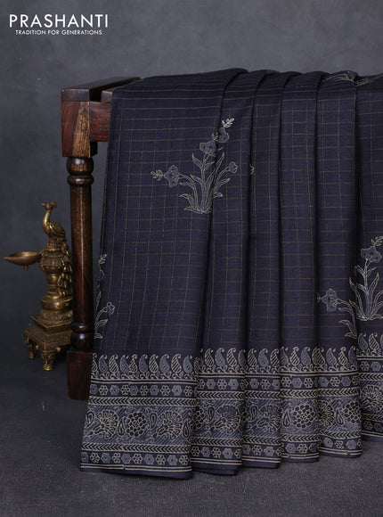 Pure tussar silk saree black with allover zari checks & butta prints and printed pallu & border