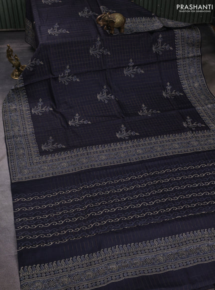 Pure tussar silk saree black with allover zari checks & butta prints and printed pallu & border