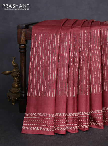 Pure tussar silk saree deep maroon with allover zari checks & prints and printed pallu & border