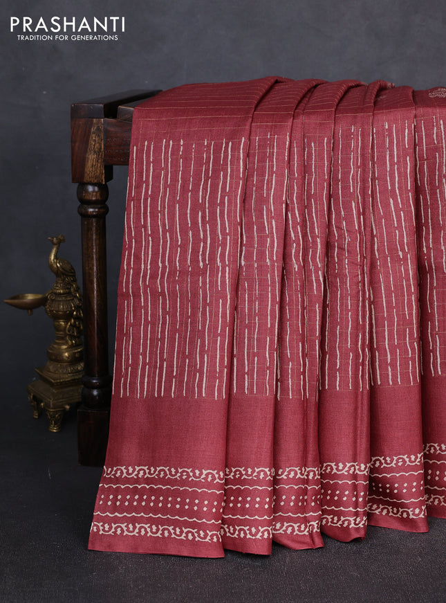 Pure tussar silk saree deep maroon with allover zari checks & prints and printed pallu & border