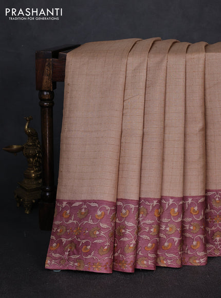 Pure tussar silk saree sandal and mauve pink with allover zari checked pattern and block printed pallu & border