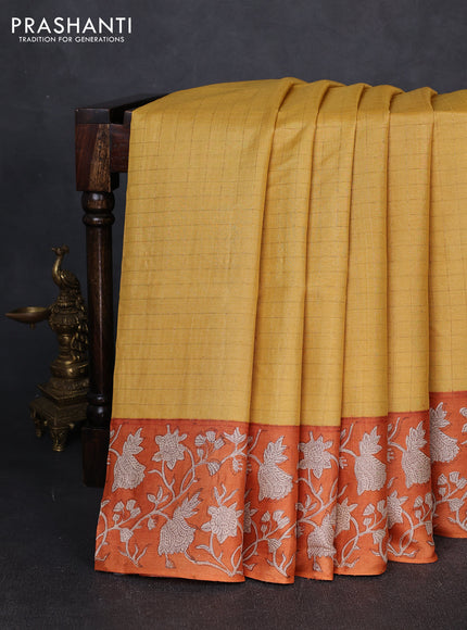 Pure tussar silk saree yellow and orange with allover zari checked pattern and block printed pallu & border