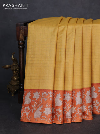 Pure tussar silk saree yellow and orange with allover zari checked pattern and block printed pallu & border