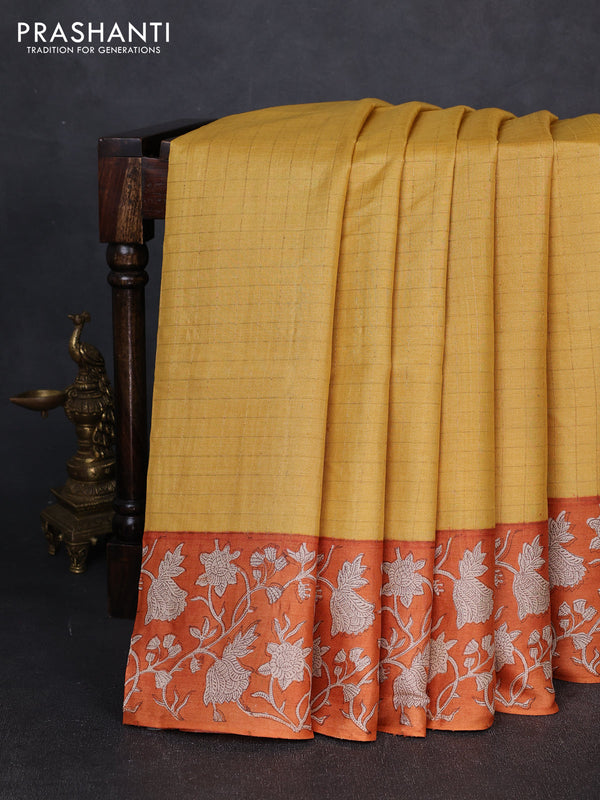 Pure tussar silk saree yellow and orange with allover zari checked pattern and block printed pallu & border