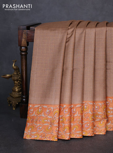Pure tussar silk saree sandal and pale orange with allover zari checked pattern and block printed pallu & border