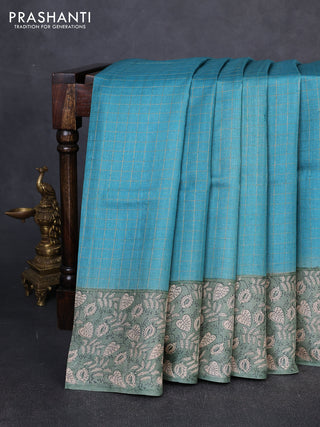 Pure tussar silk saree teal blue and pastel green with allover zari checked pattern and block printed pallu & border