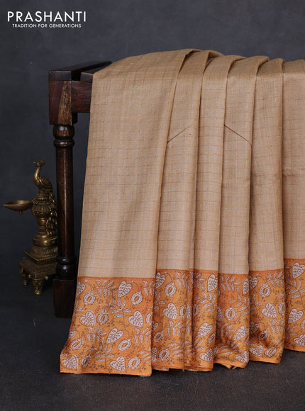 Pure tussar silk saree sandal and mustard yellow with allover zari checked pattern and block printed pallu & border