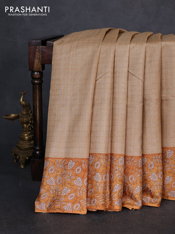 Pure tussar silk saree sandal and mustard yellow with allover zari checked pattern and block printed pallu & border