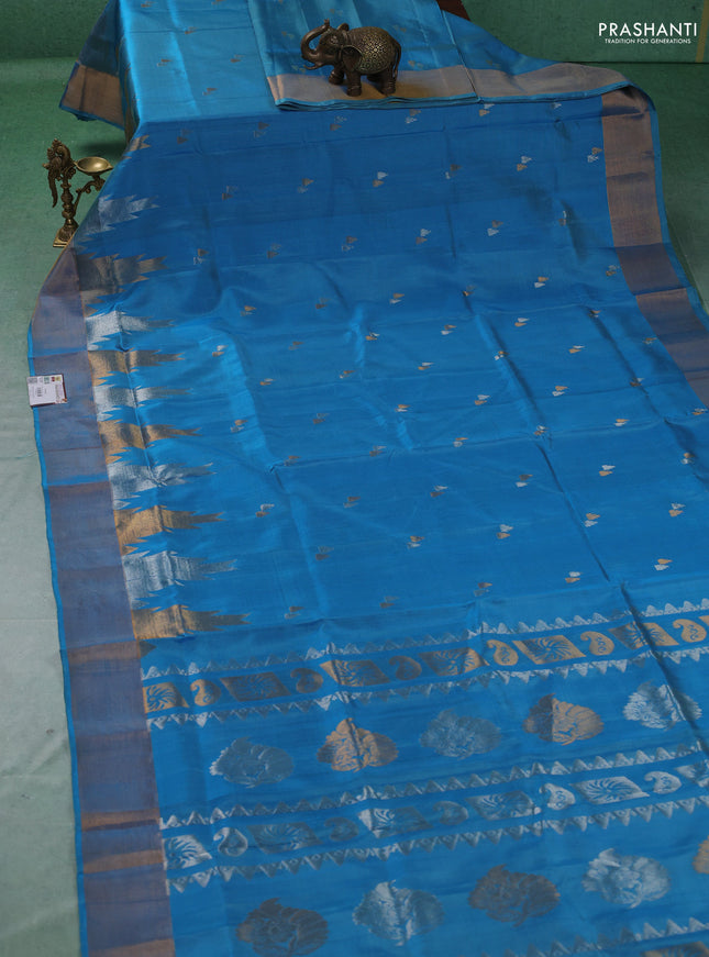Pure uppada silk saree light blue with allover silver & gold zari woven buttas and temple design zari woven border