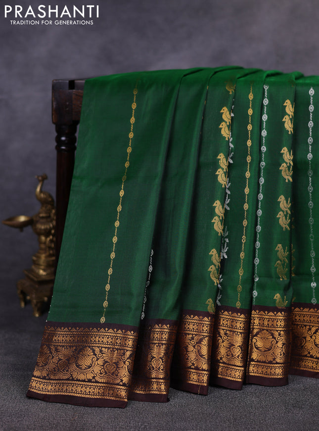 Pure uppada silk saree green and coffee brown with allover silver & gold zari weaves & buttas and zari woven border