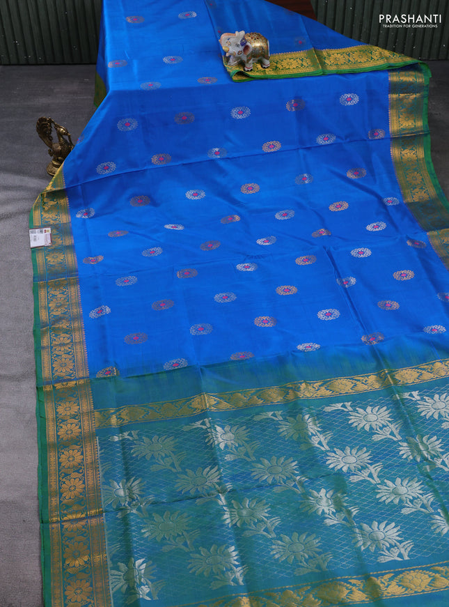 Pure uppada silk saree cs blue and green with allover silver & gold zari woven buttas and zari woven border