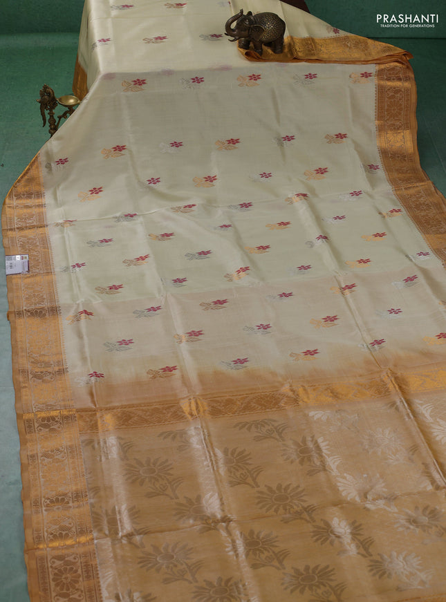 Pure uppada silk saree cream and yellow shade with allover thread & zari woven buttas and zari woven border