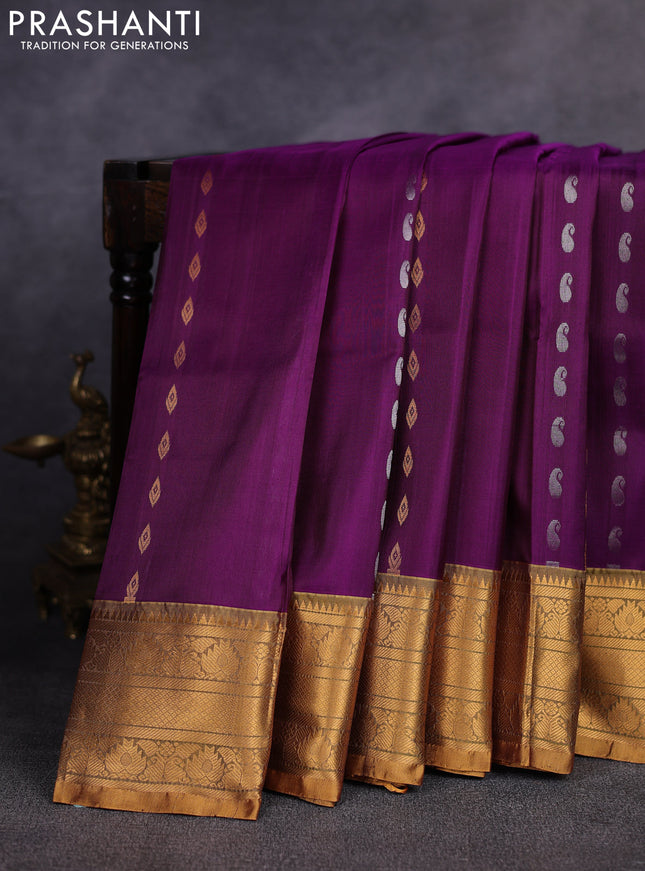 Pure uppada silk saree deep purple and mustard green with allover silver & gold zari woven buttas and zari woven border