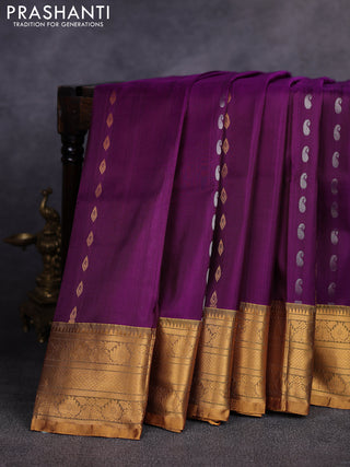 Pure uppada silk saree deep purple and mustard green with allover silver & gold zari woven buttas and zari woven border
