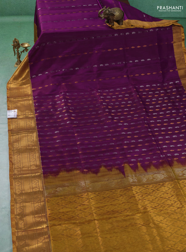Pure uppada silk saree deep purple and mustard green with allover silver & gold zari woven buttas and zari woven border
