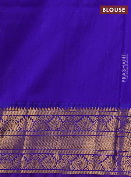 Pure uppada silk saree dual shade of green and violet with allover silver & gold zari woven buttas and zari woven border
