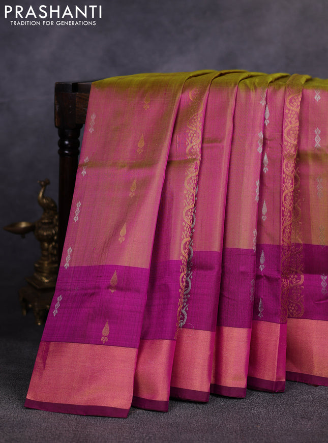 Pure uppada silk saree dual shade of pinkish mustard yellow and dark magenta pink with allover silver & gold zari weaves & buttas and long zari woven border