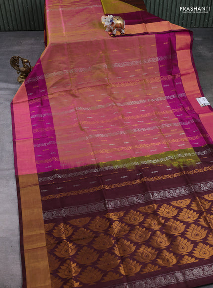 Pure uppada silk saree dual shade of pinkish mustard yellow and dark magenta pink with allover silver & gold zari weaves & buttas and long zari woven border
