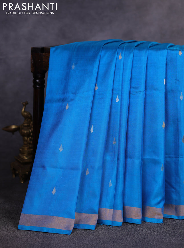 Pure uppada silk saree cs blue with allover silver & gold zari woven buttas and zari woven border
