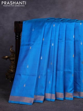Pure uppada silk saree cs blue with allover silver & gold zari woven buttas and zari woven border