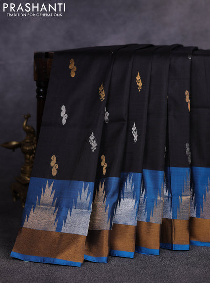 Pure uppada silk saree black and cs blue with allover silver & gold zari woven buttas and temple design zari woven border