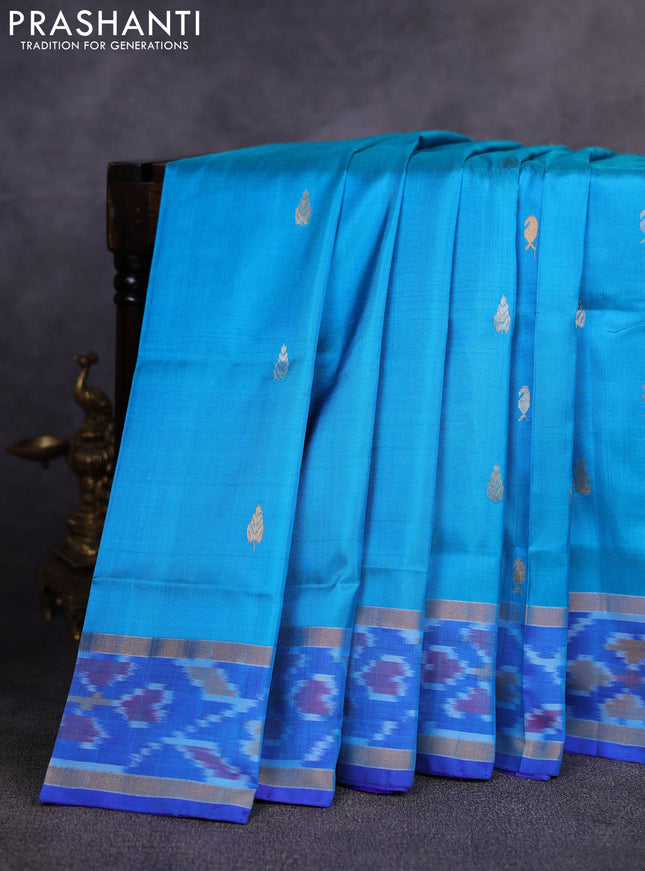 Pure uppada silk saree cs blue and blue with allover silver & gold zari woven buttas and rettapet ikat zari woven border