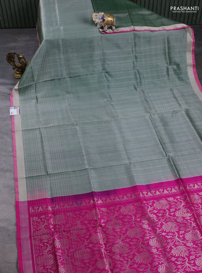 Pure uppada silk saree green shade and pink with allover silver zari woven buttas and long zari woven border