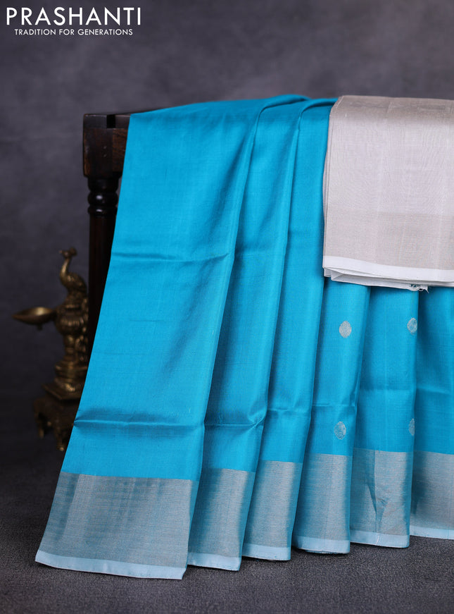 Pure uppada silk saree cs blue with allover silver zari woven coin buttas and rettapet zari woven border