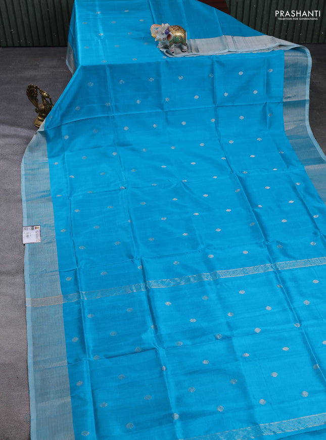 Pure uppada silk saree cs blue with allover silver zari woven coin buttas and rettapet zari woven border