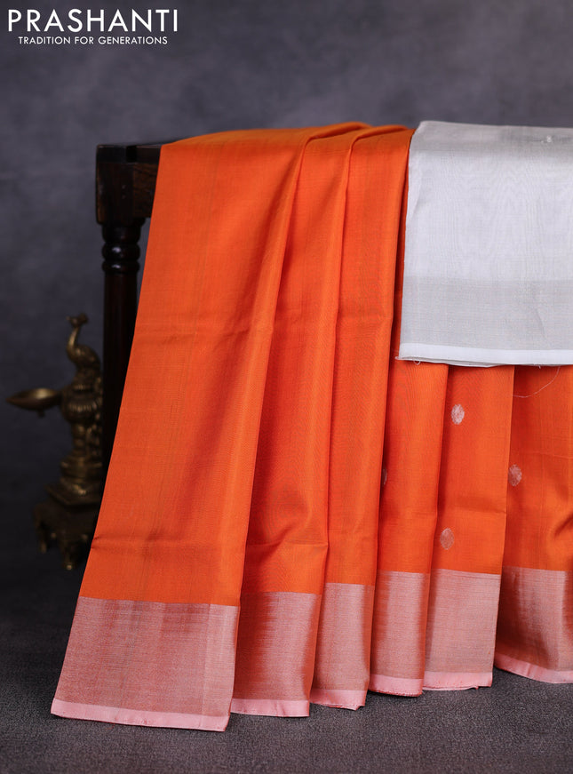 Pure uppada silk saree orange with allover silver zari woven coin buttas and rettapet zari woven border