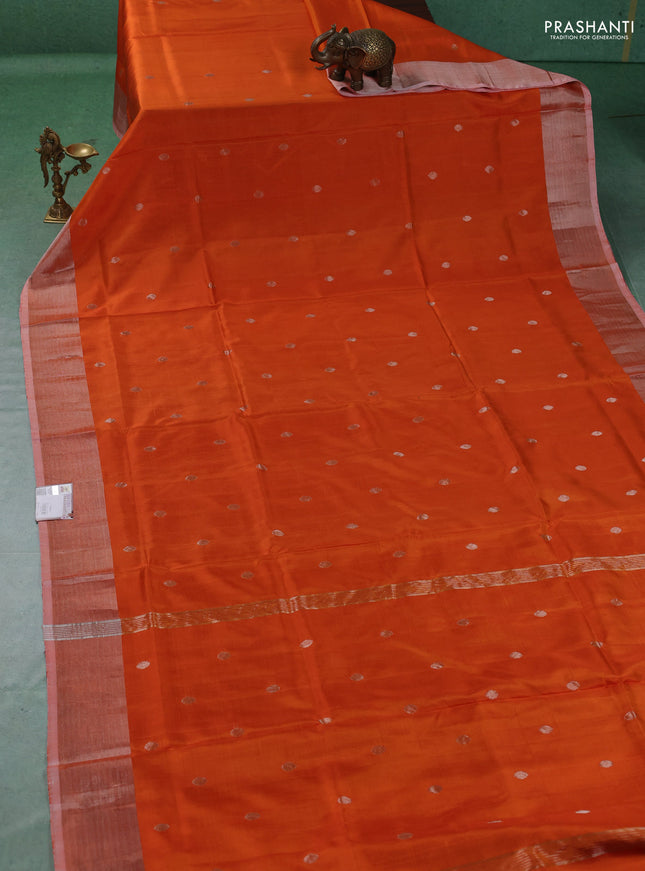 Pure uppada silk saree orange with allover silver zari woven coin buttas and rettapet zari woven border