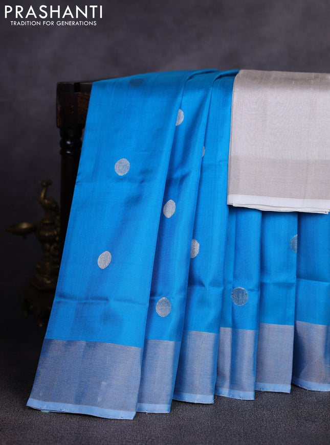 Pure uppada silk saree cs blue with allover silver zari woven coin buttas and zari woven border
