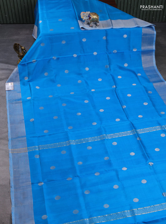 Pure uppada silk saree cs blue with allover silver zari woven coin buttas and zari woven border