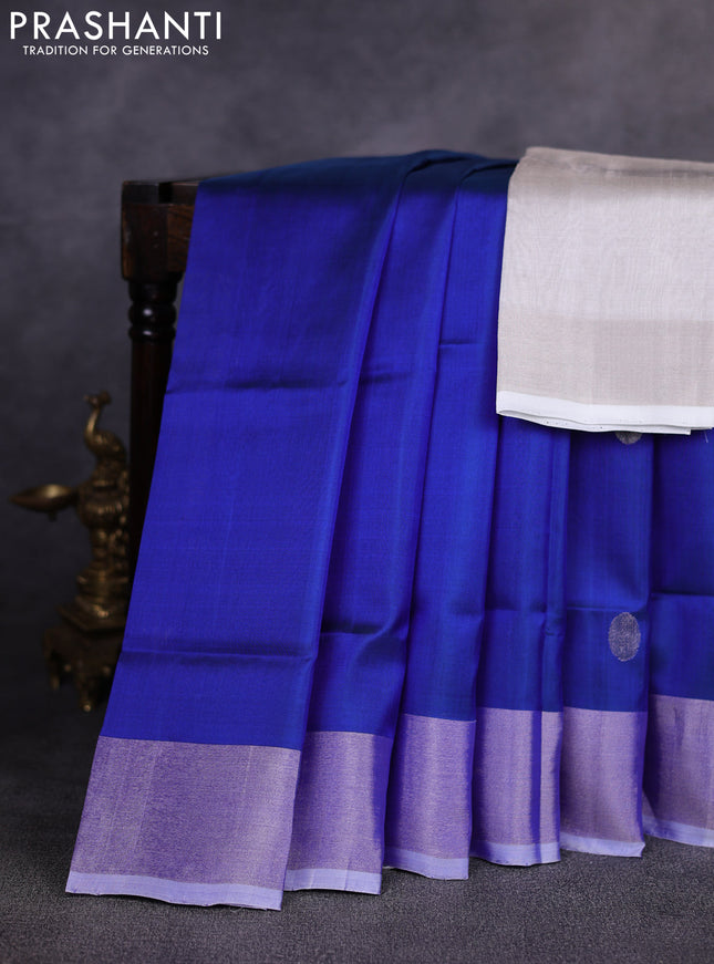 Pure uppada silk saree blue with allover silver zari woven coin buttas and zari woven border