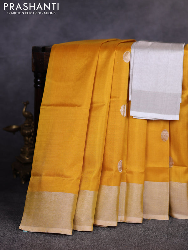 Pure uppada silk saree mustard yellow with allover silver zari woven coin buttas and zari woven border