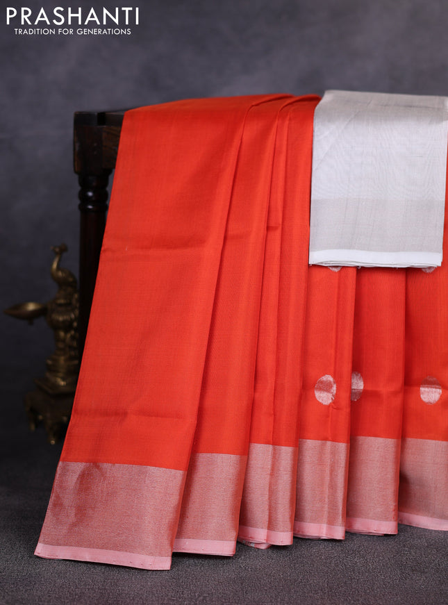 Pure uppada silk saree orange with allover silver zari woven coin buttas and zari woven border