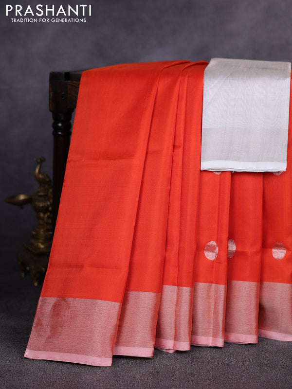 Pure uppada silk saree orange with allover silver zari woven coin buttas and zari woven border
