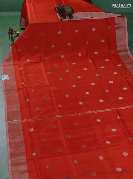 Pure uppada silk saree orange with allover silver zari woven coin buttas and zari woven border