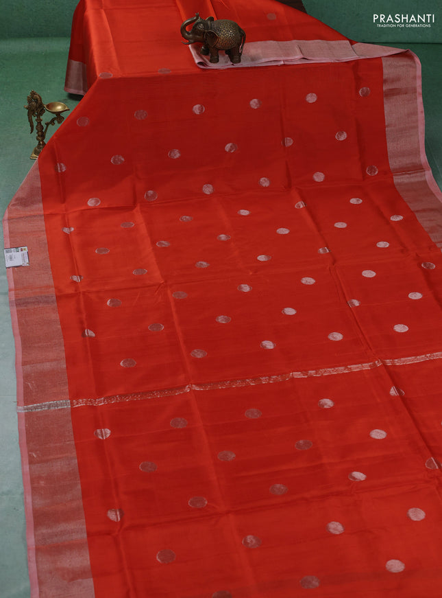 Pure uppada silk saree orange with allover silver zari woven coin buttas and zari woven border