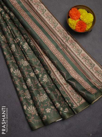 Semi tussar saree green with allover prints and zari woven piping border