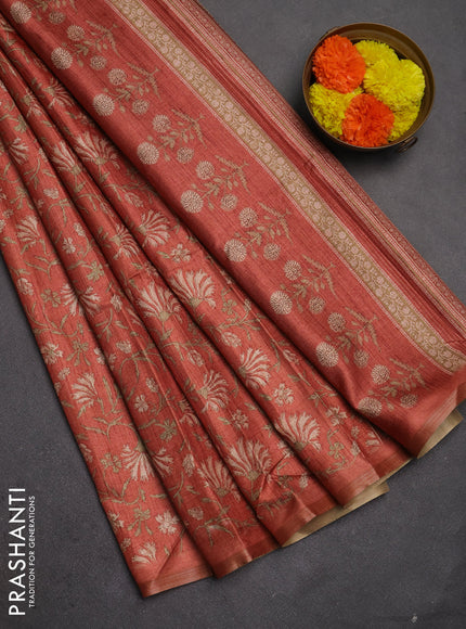 Semi tussar saree rust shade with allover prints and zari woven piping border