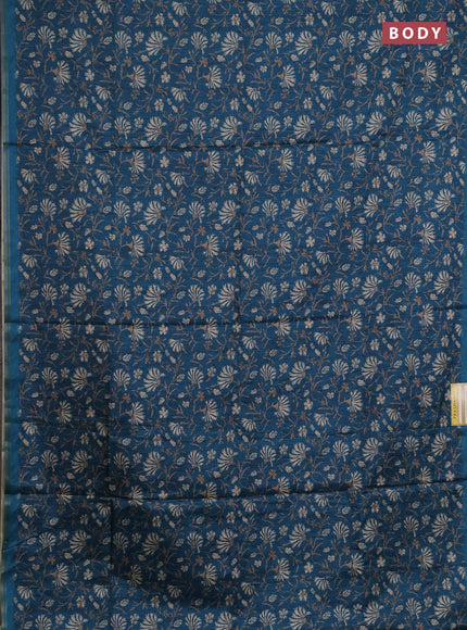 Semi tussar saree peacock green with allover prints and zari woven piping border