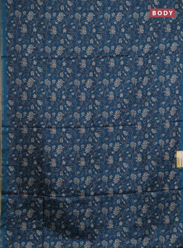 Semi tussar saree peacock green with allover prints and zari woven piping border