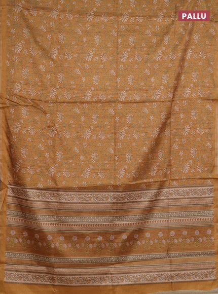 Semi tussar saree mustard yellow with allover prints and zari woven piping border