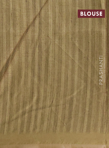 Semi tussar saree light green with allover prints and zari woven piping border