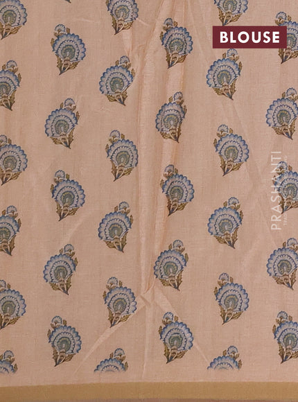 Semi tussar saree pale orange with allover floral digital prints and zari woven piping border