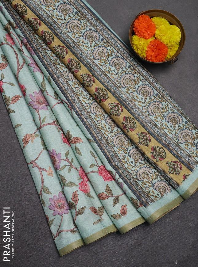 Semi tussar saree teal blue with allover floral digital prints and zari woven piping border