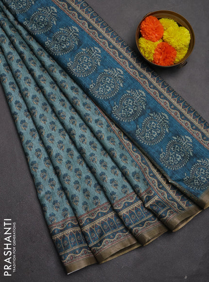 Semi tussar saree teal blue and peacock blue with allover floral buttas and printed zari woven border